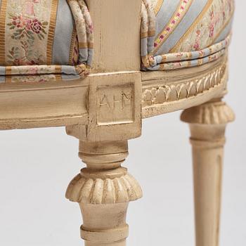 A set of nine Gustavian chairs by A Hellman (master in Stockholm 1761-94) and E Ståhl (master in Stockholm 1794-1820).