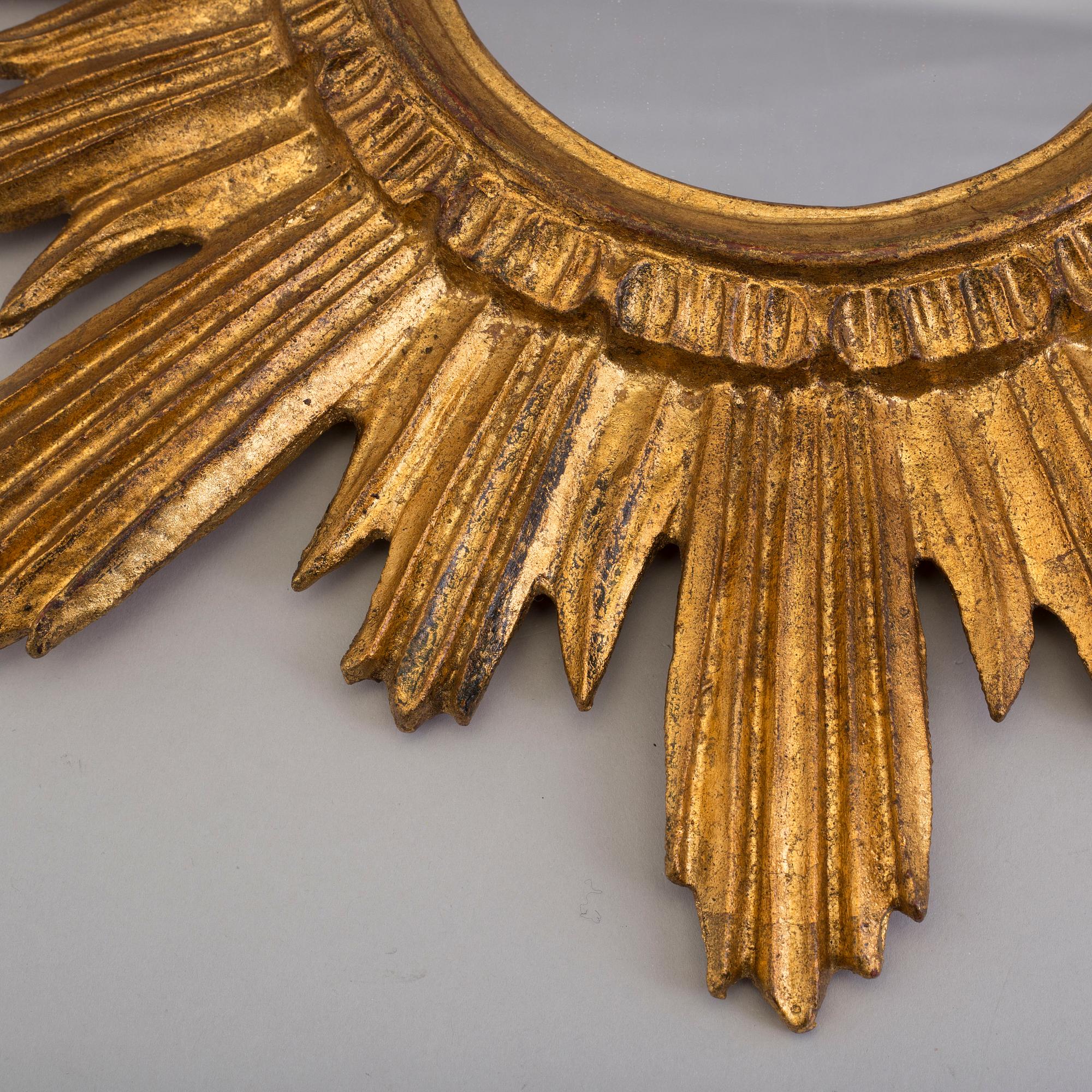 A late 20th Century sun shaped mirror.