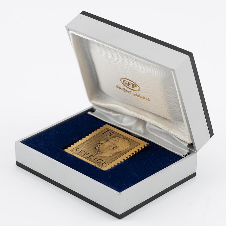 Plaque, 18K gold, numbered 372/1000, 1975, weight approx. 27 g.