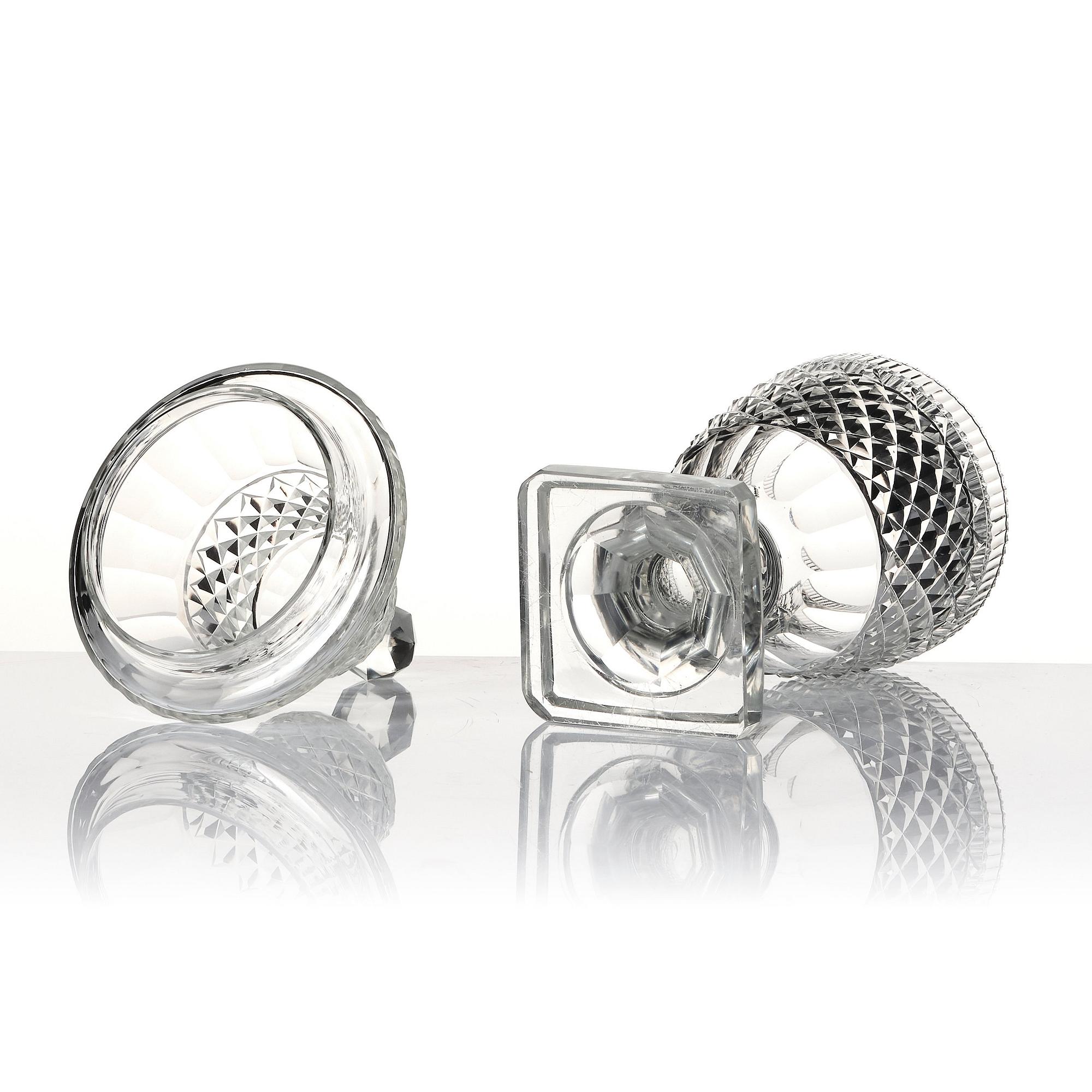 A set of two cut glass jars with covers, Anglo/Irish, 19th Century.