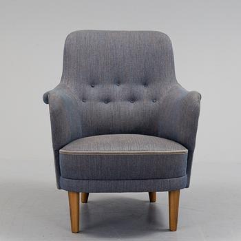 A lounge chair by Carl Malmsten, around the mid 20th century.
