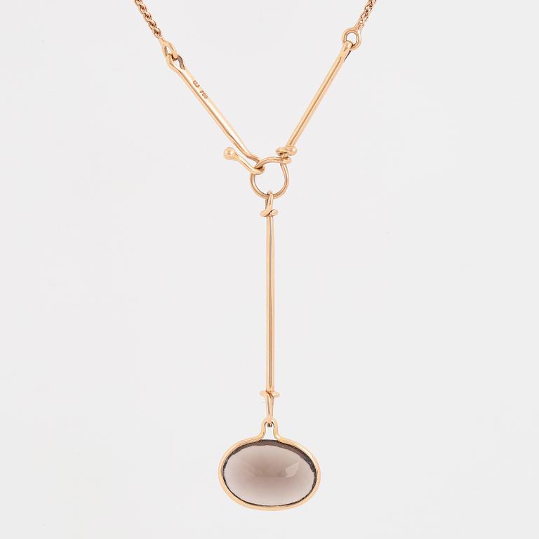 GEORG JENSEN, a "Savannah" pendant set with an oval faceted smoky quatrz.