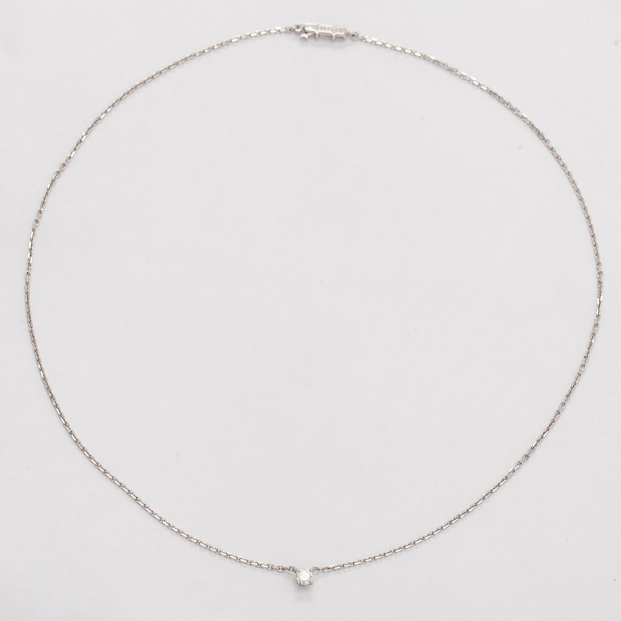 Cartier, an 18K white gold '1895' necklace with a brilliant-cut diamond.