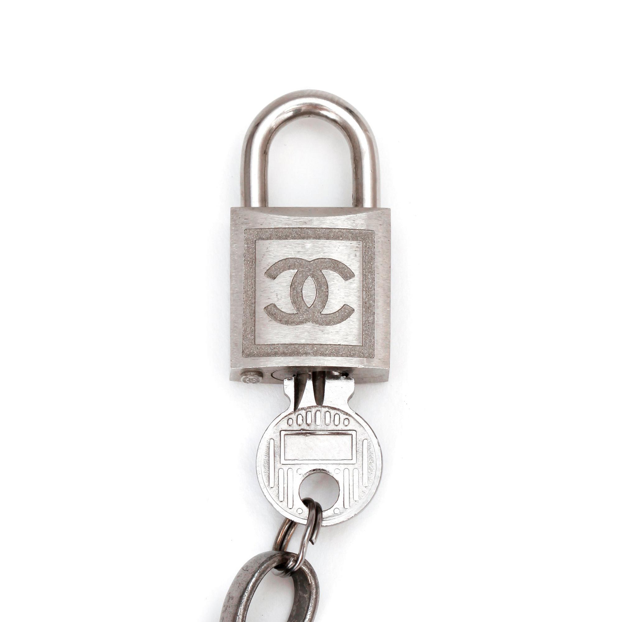 CHANEL, a chain belt.
