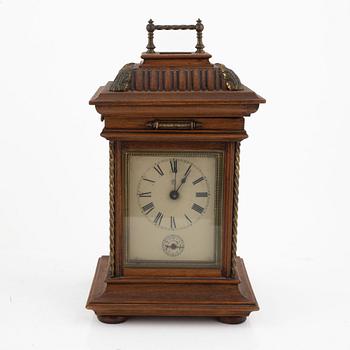 A mantle clock with a polyphon music box, around 1900.