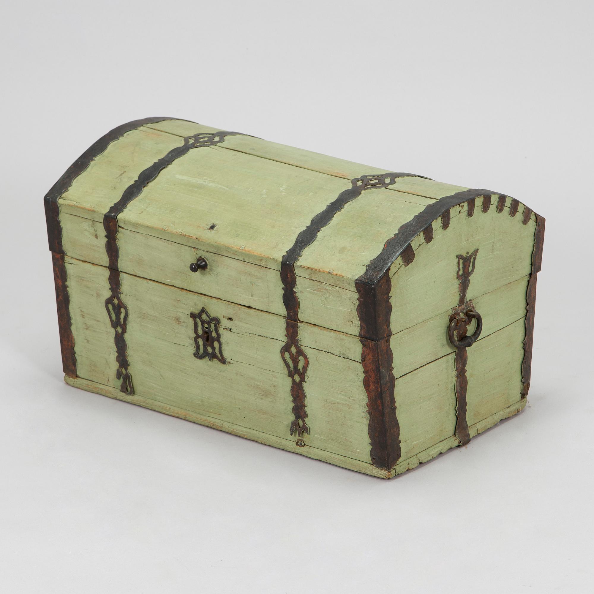 A wooden storage chest dated year 1777.