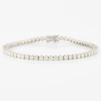 Tennis bracelet 18K white gold with brilliant-cut diamonds.