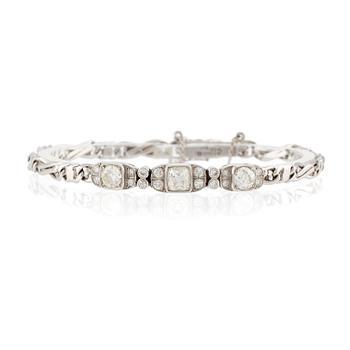 498A. An 18K white gold bracelet set with old-and eight-cut diamonds.