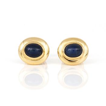 MANSCHETTKNAPPAR, ett par, 18K guld med cabochonslipade safirer, tot ca 8,70 ct. Total vikt ca 13,63 g.