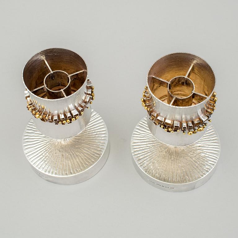 A pair of Karlheinz Sauer silver candlesticks, Västerås, Sweden 1972.