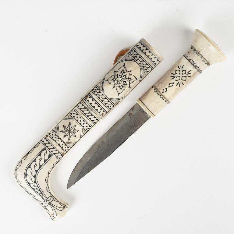 A reindeer horn knife attributed to Ante Jönsson, signed.