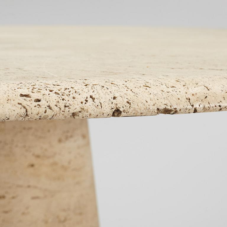 A travertine dining table, late 20th century.