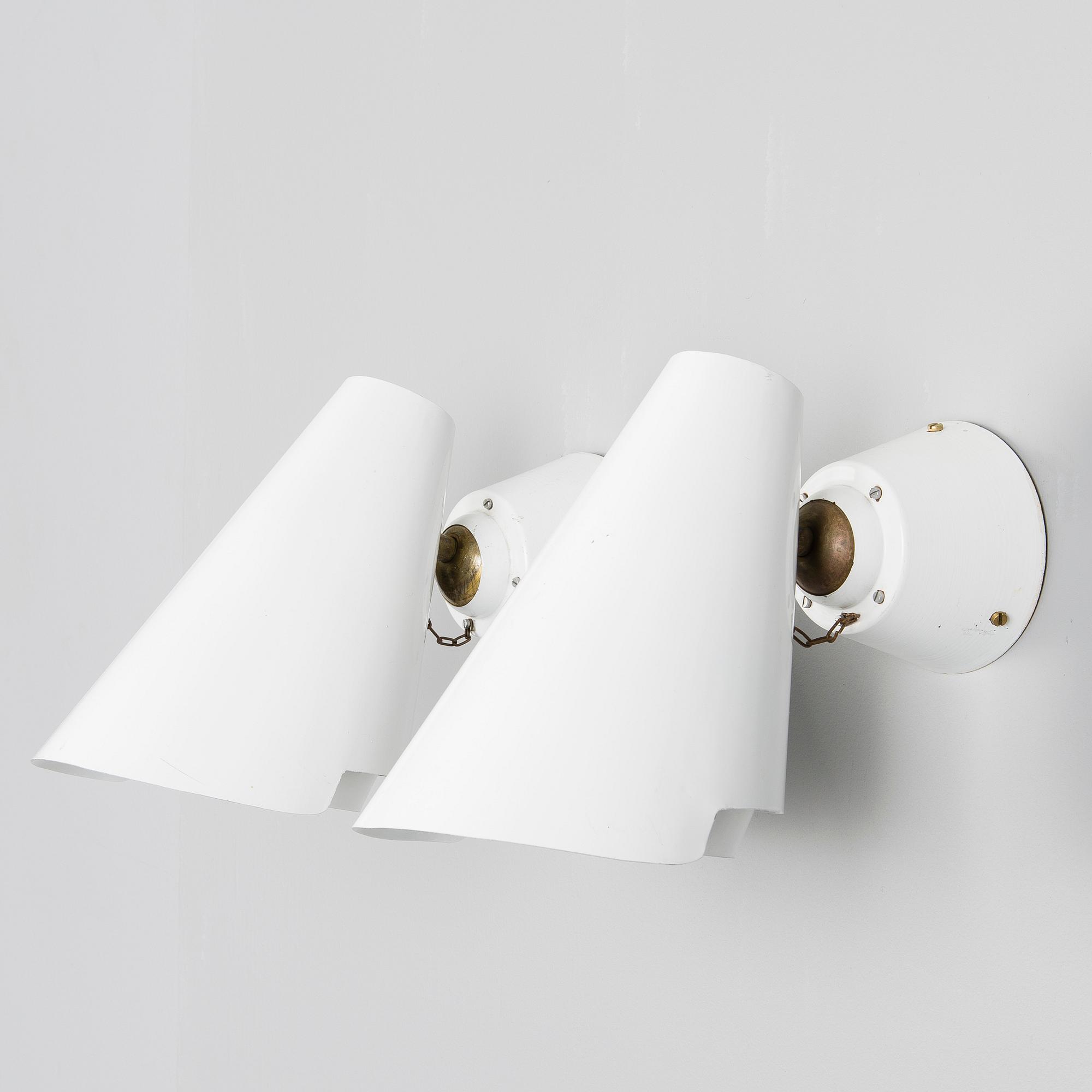 PAAVO TYNELL, A PAIR OF WALL LIGHTS. Model 2351. Marked Idman, 1950s.
