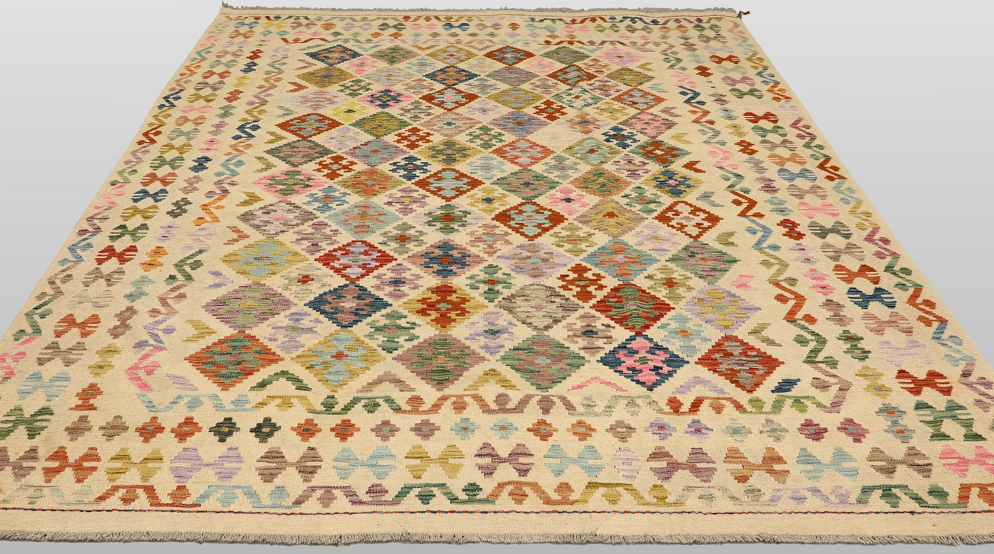 A Kilim rug, approx. 295 x 243 cm.