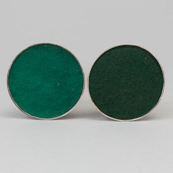 A pair of silver candle sticks, dated 1903.