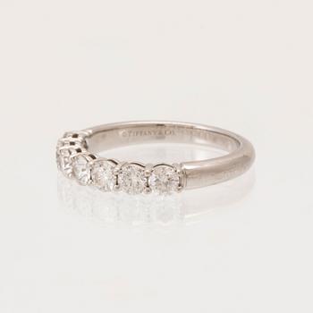Tiffany & Co, a half eternity ring in platinum 950 with round brilliant-cut diamonds.