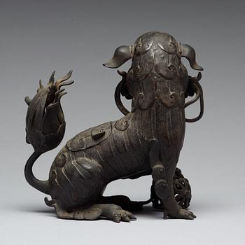 A bronze censer with cover in the shape of a Buddhist lion, Qing dynasty, 19th Century.