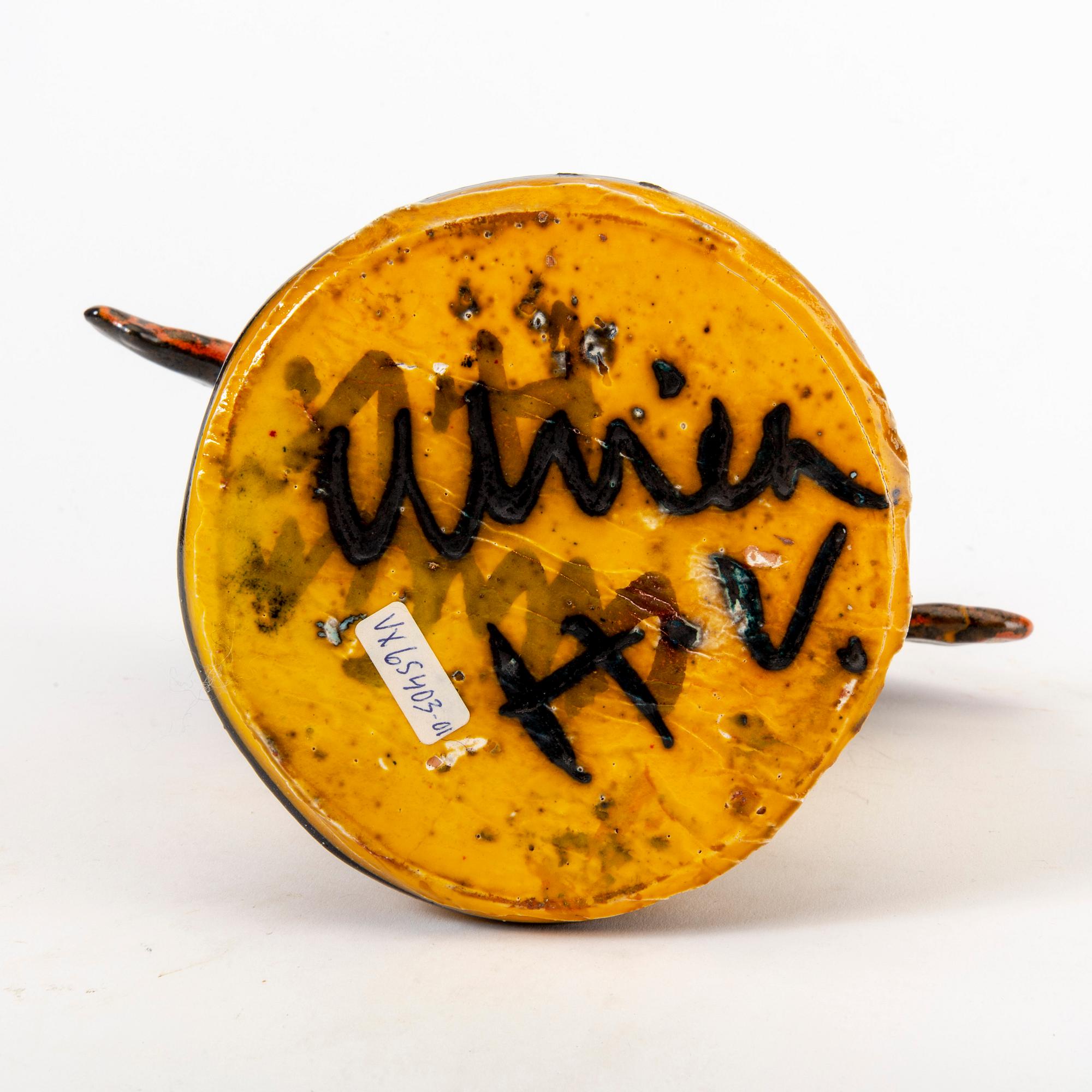 A signed Ulrica Hydman-Vallien stoneware figurine.