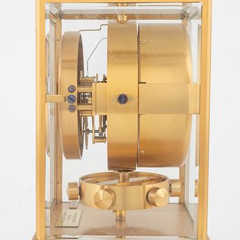 Jaeger LeCoultre, an Atmos table clock.