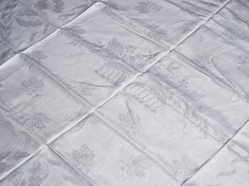 264. A tea table cloth, linen damask, "Lilla blomsterkorgen", ca 143,5 x 144 cm.