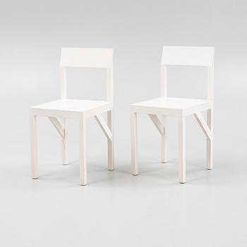 A pair of signed white stained pine chairs by Frederik Gustav for Frame, Copenhagen, 2023.