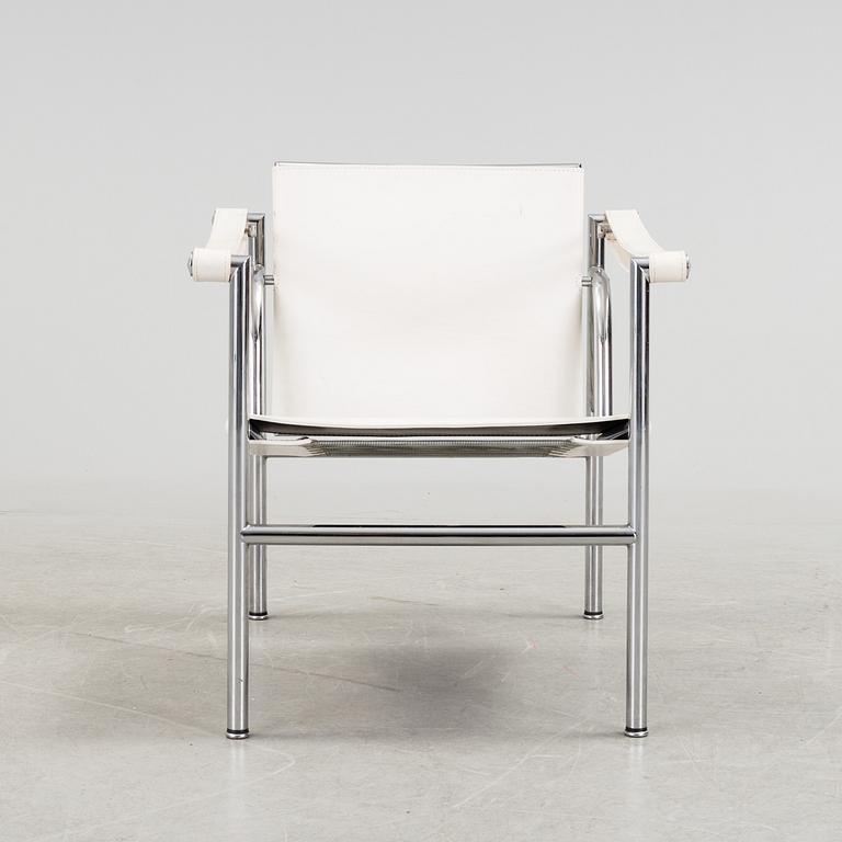 A "LC-1" ARMCHAIR DESIGNED BY LE CORBUSIER FOR CASSINA.