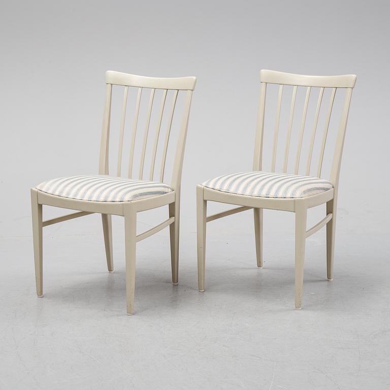 A dining table and six chairs by Carl Malmsten for Bodafors.