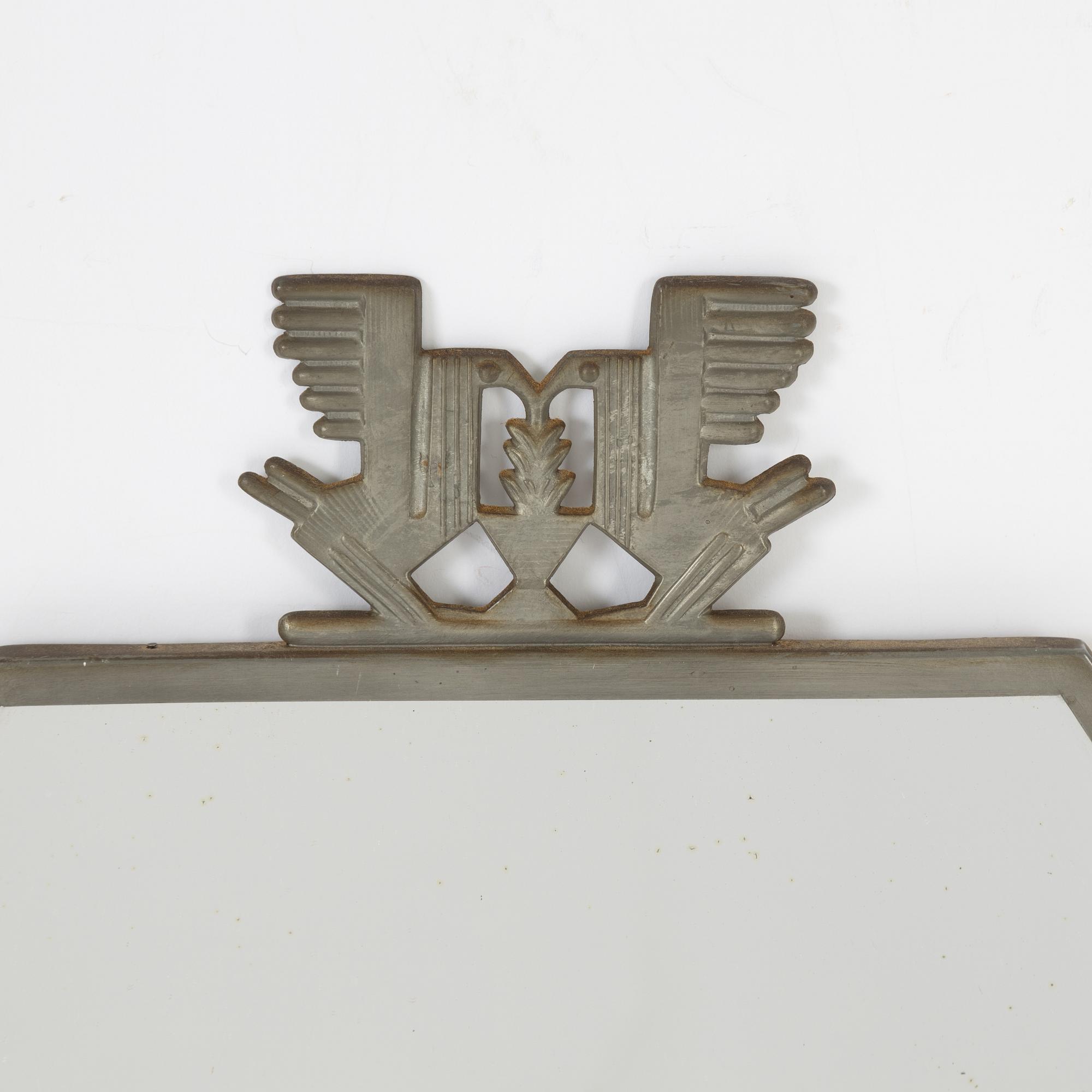 A Swedish pewter mirror, 1934.