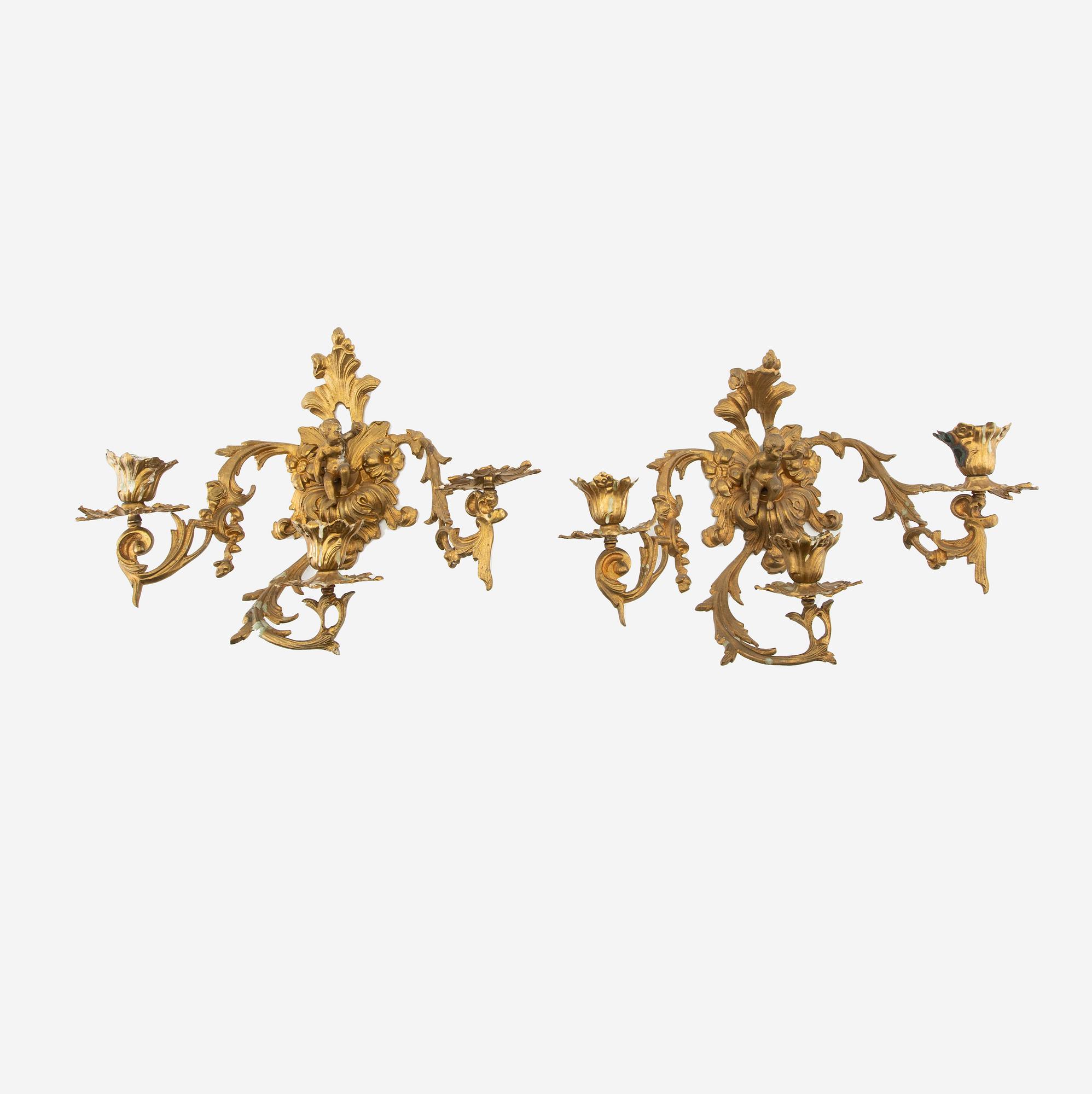A pair of Louis XV style appliqués, late 19th century.
