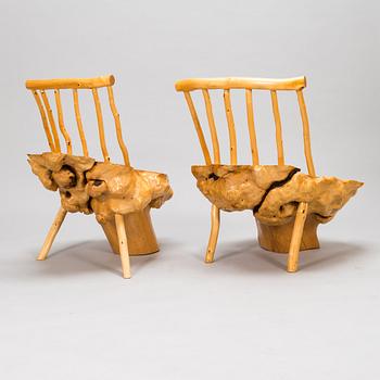 A pair of mid-20th century burr wood easy chairs made by  Johannes Järvelä, Finland.
