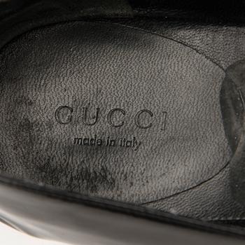 A Pair of Black Leather Ballerinas, size 40.