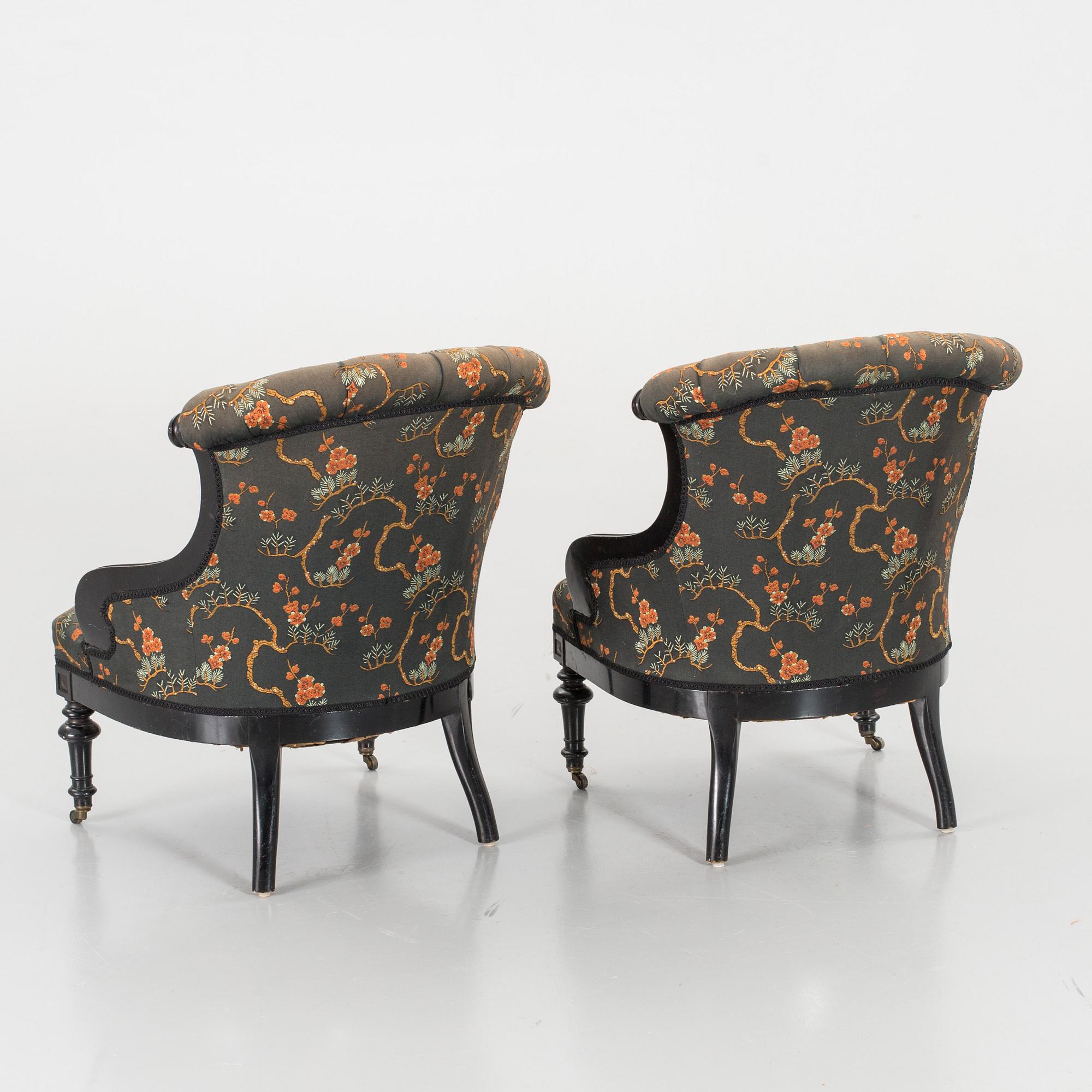A pair of late 19th century lounge chairs.