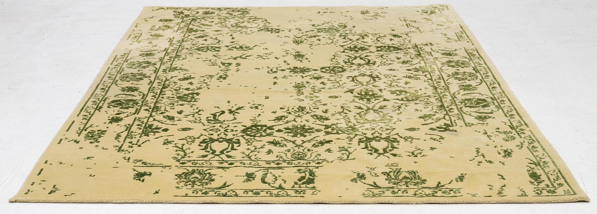 Rug, India, wool and silk with bamboo, approx. 230 x 173 cm.