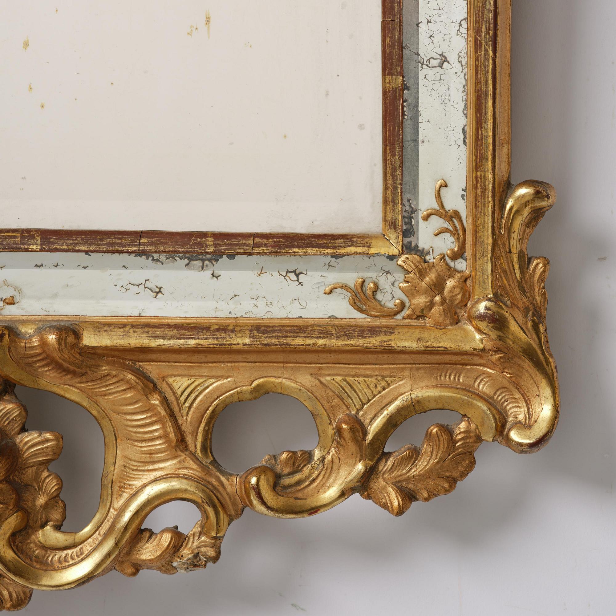 A rococo giltwood mirror, Stockholm, later part 18th century.