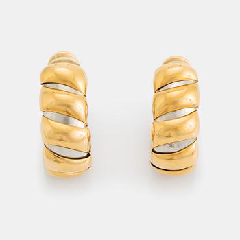 504. A pair of 18K gold and steel Bulgari earrings.