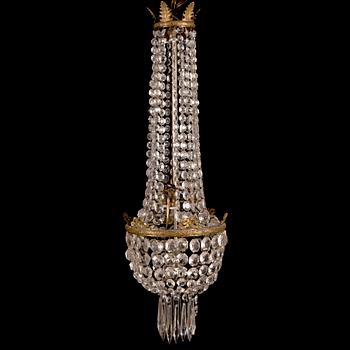 An early 20th century cut glass chandelier.