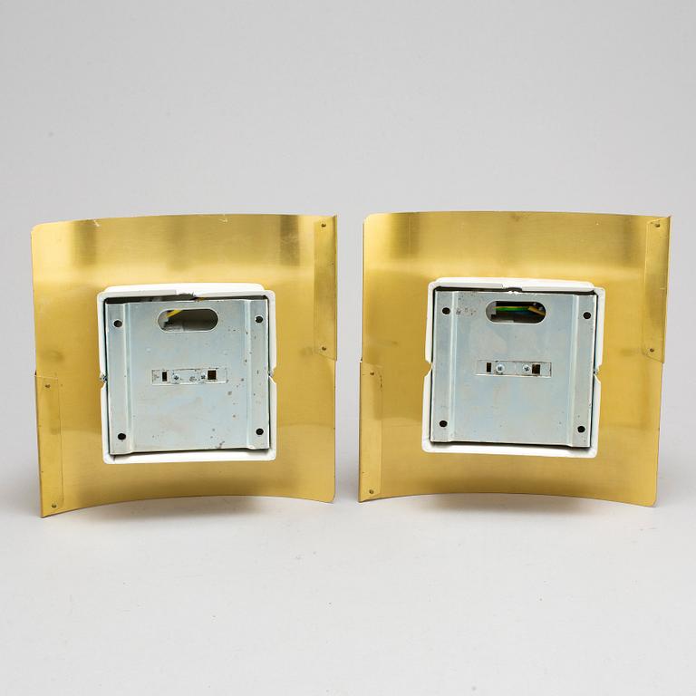 A pair of "Band" wall lamps by Peter Celsing for Falkenbergs belysning.