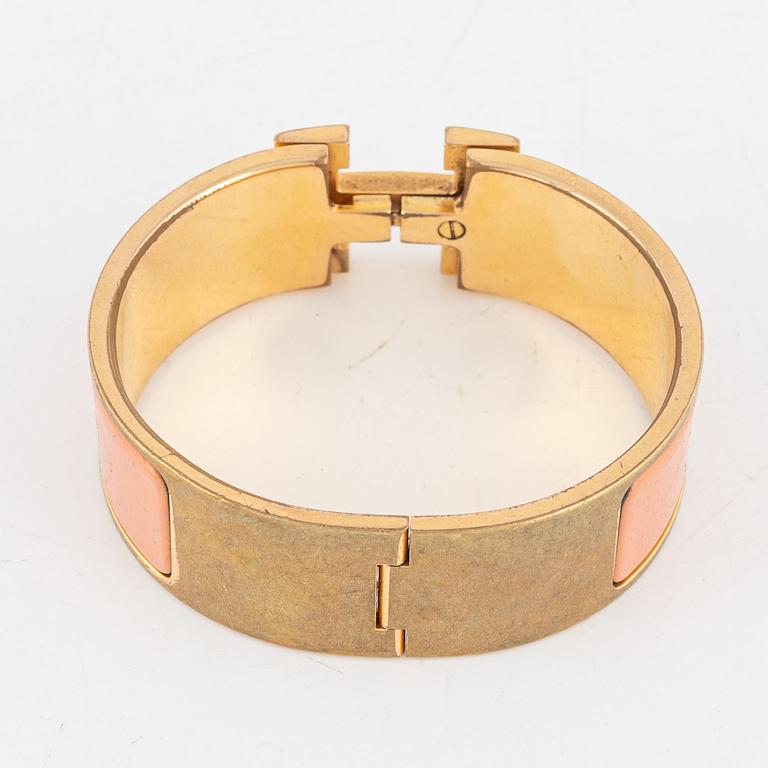 Hermès, a 'Clic Clac H' bracelet.