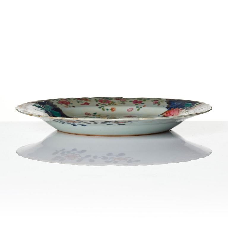 A set of three famille rose 'tobacco leaf' plates, Qing dynasty, Qianlong (1736-95).