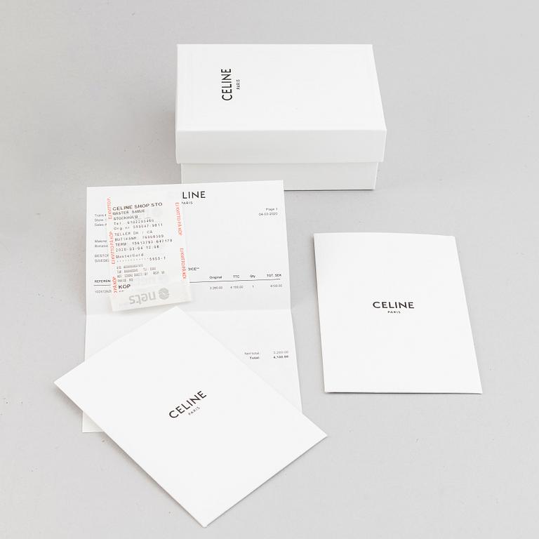 Céline, a canvas and leather handbag and wallet, 2020.