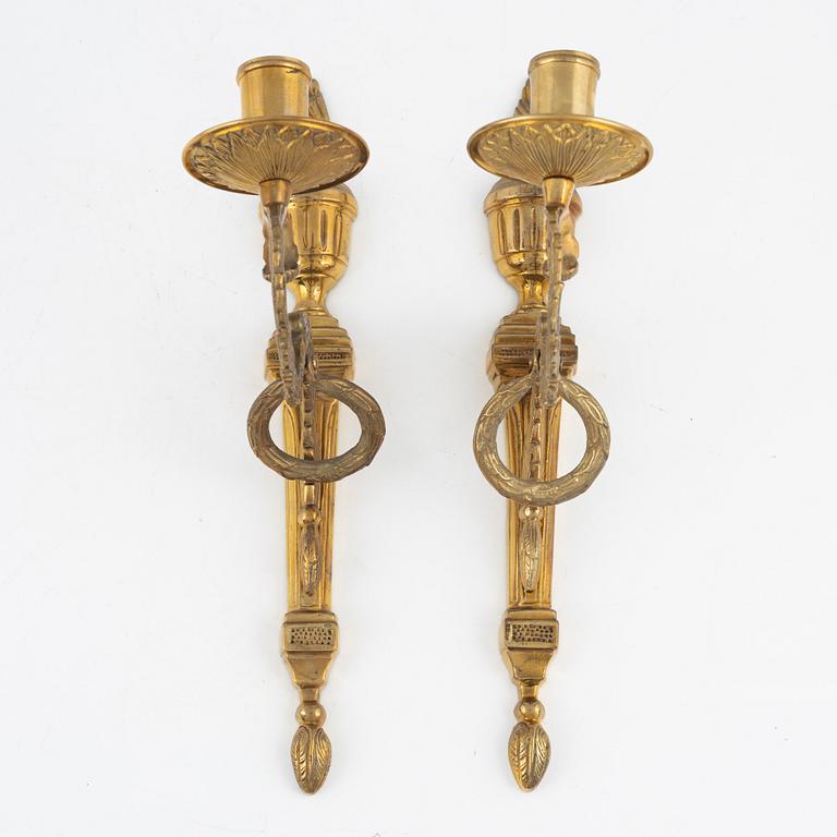 A pair of 'Törne' brass one-light wall ligths from IKEA's 18th Century collection.