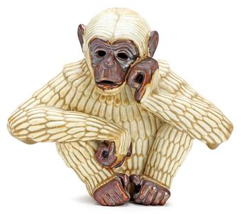413. A Gunnar Nylund stoneware figure of an ape, Rörstrand.