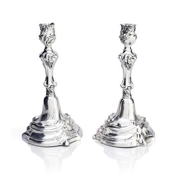 245. A pair of Swedish Rococo silver candlesticks, marks of Abraham Lundberg, Stockholm 1765.