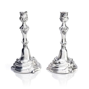 245. A pair of Swedish Rococo silver candlesticks, marks of Abraham Lundberg, Stockholm 1765.