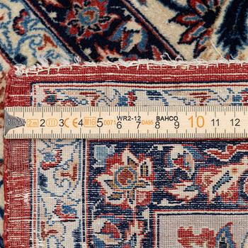 A semi-antique Isfahan rug, Central Persia, signed (Sadegh) Seirafian, c. 237 x 146 cm.