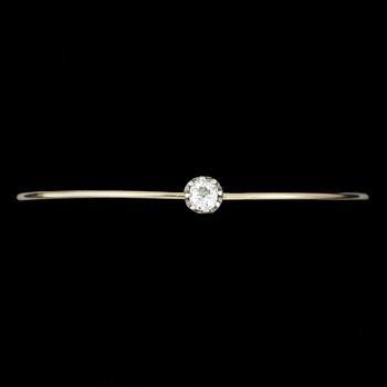 ARMRING, 18k guld samt antikslipad diamant ca 0.5 ct. Vikt ca 7,2 gram.