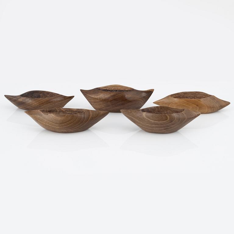 Magnus Ek, a set of five walnut wood canapé holders for Oaxen Krog.