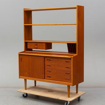 A 1960s teak veneered shelf.