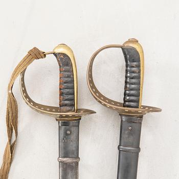 Two Swedish sabres, 1893 cavalry pattern, with scabbards.