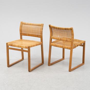 Børge Mogensen, four 'BM61' rattan and oak chairs.